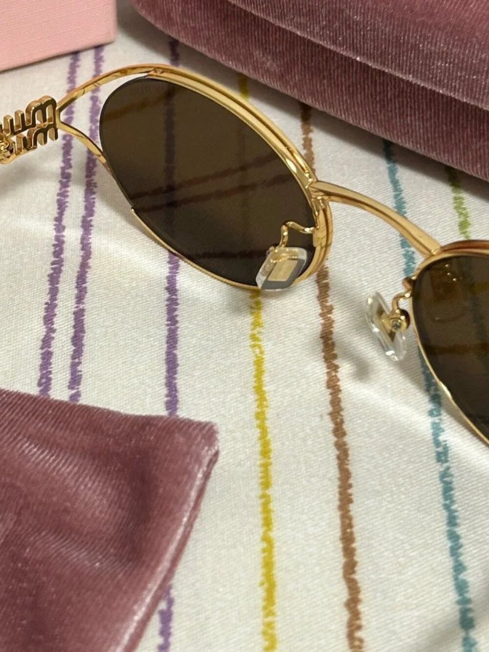 Miu Miu Oval Gold Frame Sunglasses - Picture 7 of 7